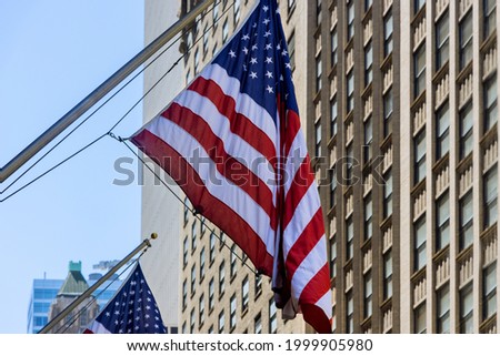 Cityscape architecture building Manhattan with tourist scene flag of America over New York City
