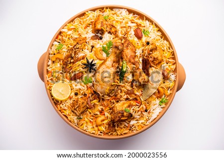 Dum Handi chicken Biryani is prepared in an earthen or clay pot called Haandi. Popular Indian non vegetarian food Royalty-Free Stock Photo #2000023556