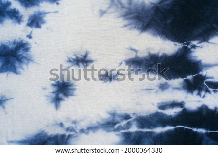 Blue tie dye made on white fabric. Texture or Background.