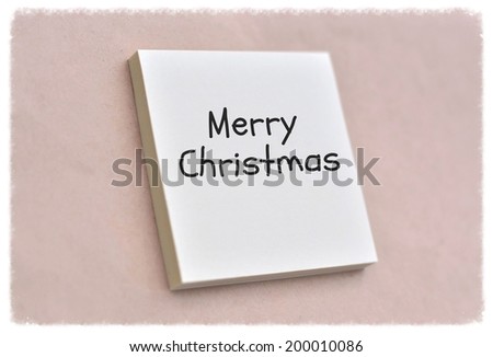 Text Merry Christmas on the short note texture background