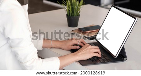 Close up of businesswoman or accountant working laptop financial data report, accountancy document and laptop computer at office, business concept
