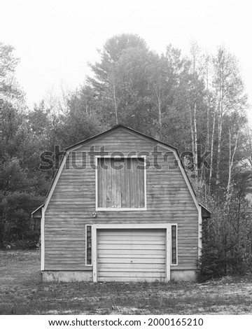 An old garage with autumn color in Hanover, Maine