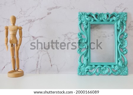 Home decoration with Vintage wood frame on table. 
