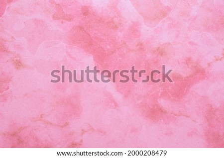 Pink wall background with marble pattern. Horizontal format. Texture 