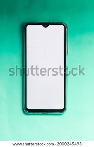 Blank phone on isolated surface, top view,new mobile phone stock image 