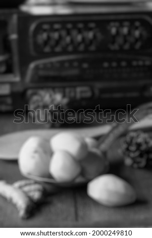 Blur photo of Indonesian food ingredients such as potatoes, white pepper, coriander, and red chili