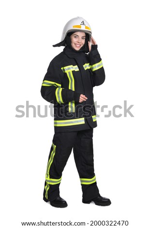 Full length portrait of firefighter in uniform and helmet on white background