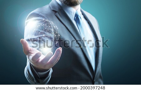 Businessman holding of global data and social network of databases.