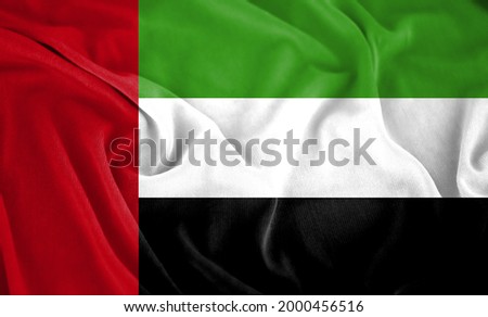 Waving Fabric Texture of the Flag of United Arab Emirates. Waving Flag of the United Arab Emirates
