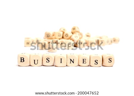 word with dice on white background - business