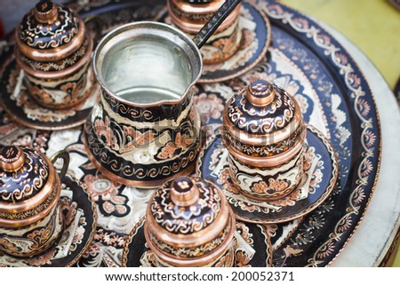 Handmade artisan colorful arabic Turkish tea set in a Bazaar in Istanbul, Turkey.