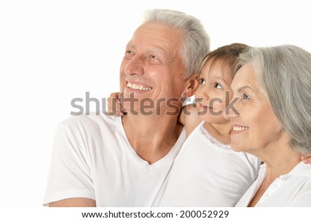 Happy Grandparents with little girl isolated on white