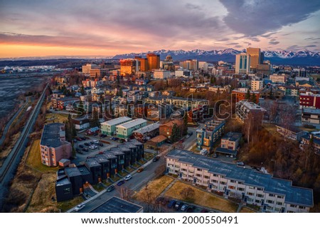 Aerial View of a Sunset over Downtown Anchorage, Alaska in Spring Royalty-Free Stock Photo #2000550491