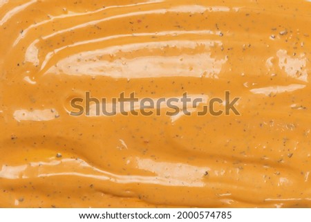 Whipped delicious sauce texture. Hamburger sauce background. Top view. 