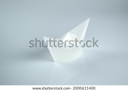 A white ship on a white background. A picture of minimalism