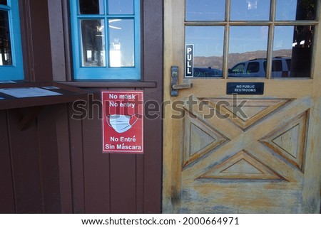 a door with instructional sign