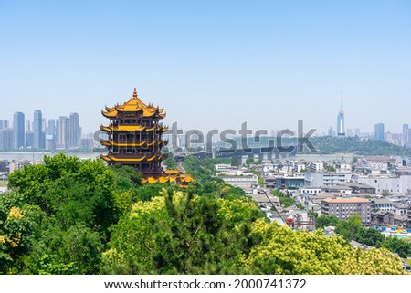 Wuhan landmark .The yellow crane tower , located on snake hill in Wuhan, is one of the three famous towers south of yangtze river,China. Royalty-Free Stock Photo #2000741372