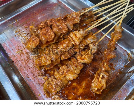 Pork on stick with Mala sauce is one of Chinese spices which gives spicy taste and make tongue numb.  A popular dish is grilled meat in Thai street food