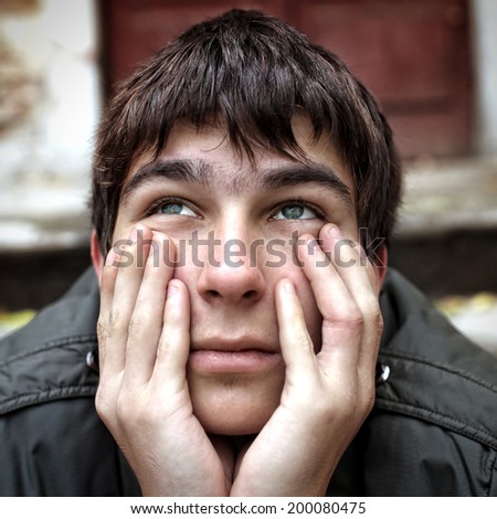 Toned photo of sad Teenager Portrait outdoor