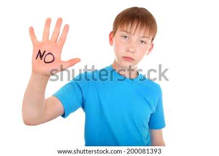 Focus on the Palm. Kid shows the palm gesture with an inscription NO