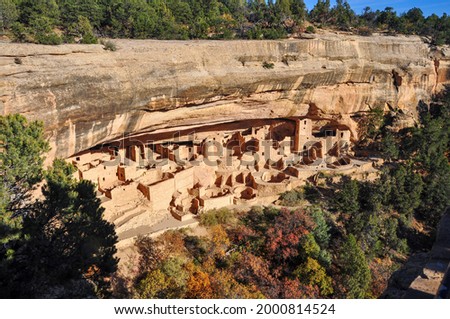 High angle view of the cliff dwellings and Cliff Palace as part of preserved ancestral Puebloan archaeological site in Mesa Verde National Park, Colorado, USA Royalty-Free Stock Photo #2000814524
