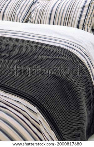 Close up image of Bed mattress Duvet with pillow and blanket 
