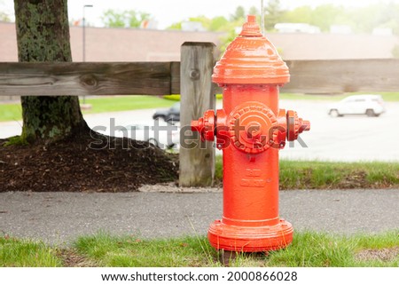 Connecting fire hose in the garden with nature background in boston. Equipment for fire hose connection.

