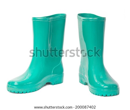 A pair of green boots isolated on white background  Royalty-Free Stock Photo #200087402