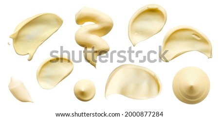 Mayonnaise drop and splash sets. White sause isolated stain top view. Elements for design in food or cosmetic sphere. High resolution photo. Royalty-Free Stock Photo #2000877284