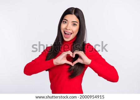 Photo of flirty impressed brown long hairdo lady show heart wear red sweater isolated on grey color background