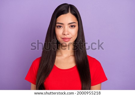 Photo of adorable shiny woman dressed red t-shirt smiling isolated purple color background