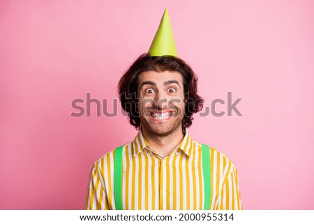 Photo of young handsome man excited happy positive smile wear party hat isolated over pastel color background