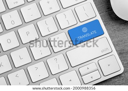 Modern computer keyboard with button for quick translation, closeup Royalty-Free Stock Photo #2000988356