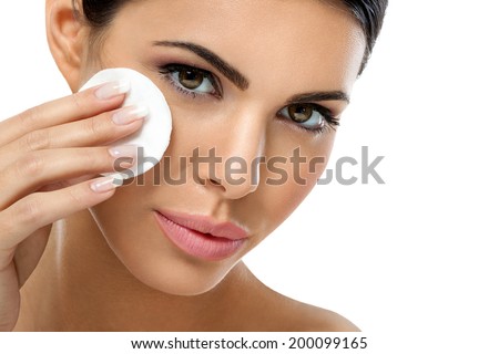 skin care woman removing face makeup with cotton swab pad - skin care concept. Royalty-Free Stock Photo #200099165
