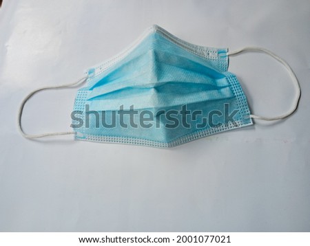 medical mask to prevent contracting the virus, white background.