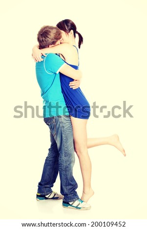 Beautiful happy young couple kissing