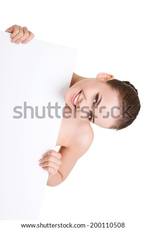 Woman with perfect skin and beautyful face holding blank board