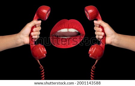 Female red lips taking on an old fashioned dial phone mirrored image