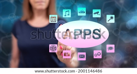 Woman touching an apps concept on a touch screen with her finger