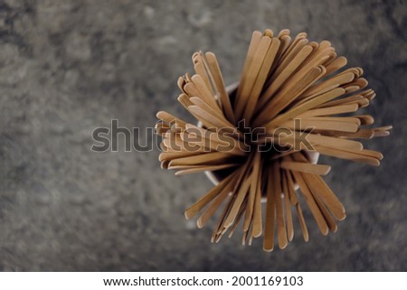 Coffee Stirrers On A Cafe Counter Royalty-Free Stock Photo #2001169103