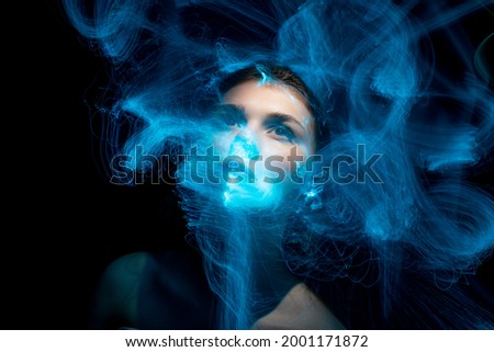 lightpainting portrait, new art direction, light drawing at long exposure