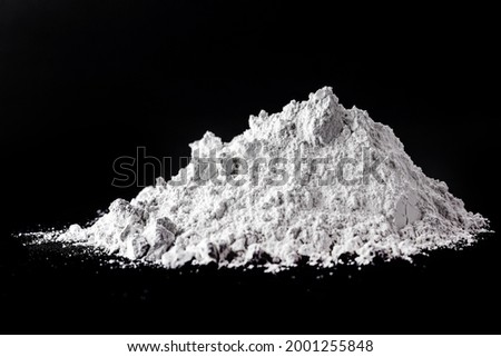 zinc oxide, white powder used as a fungus growth inhibitor in paints and as an antiseptic ointment in medicine Royalty-Free Stock Photo #2001255848