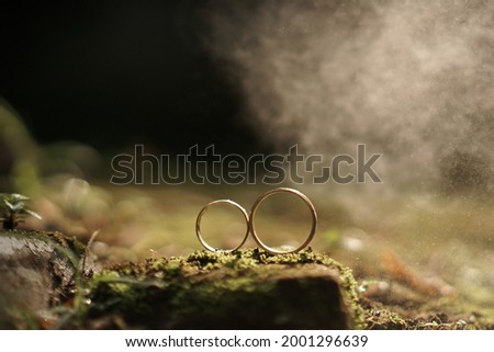 A cinematic wedding ring pictured in the morning