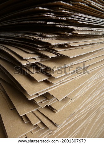 Stacked of corrugated of carboard for packing Royalty-Free Stock Photo #2001307679