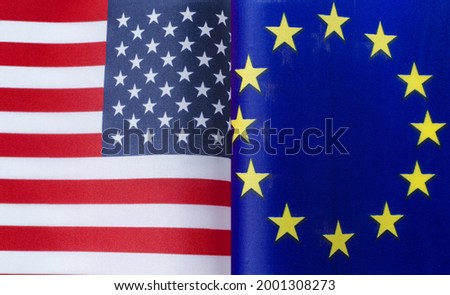 fragments of the national flags of the United States and the European Union in close-up