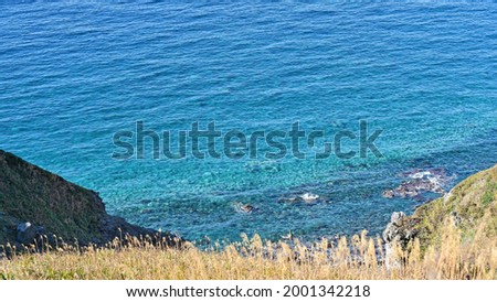 Scenery of the cliffs and the Sea of Japan stained in Shakotan blue seen from the Kamui Cape Observatory at Shakotan, Hokkaido