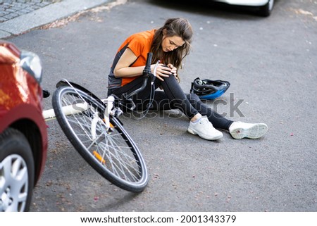 Car And Cyclist Accident And Injury. Bicycle Crash