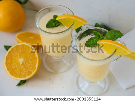 Orange banana shake with yogurt.