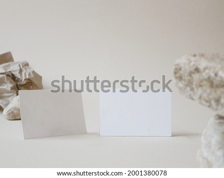 White empty space card mockup for female business card design presentation with minimalist beige natural background.
