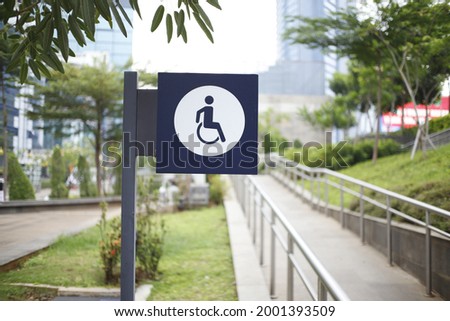 a symbol to provide information that the place is friendly for people with disabilities